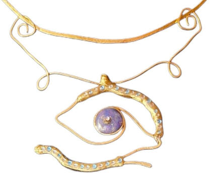 Handmade brass necklace with a hand-painted eye sealed in resin, from the Road Talismans collection.