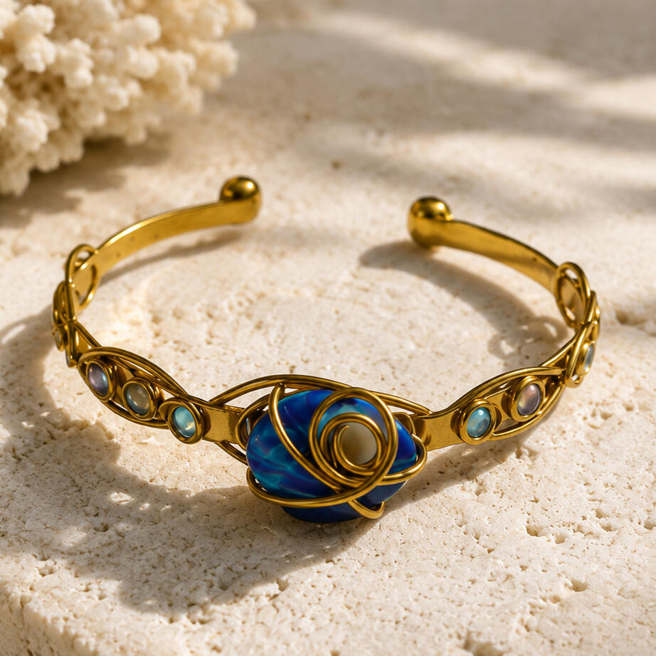 Handcrafted brass cuff bracelet with blue mother of pearl, Aegean Orbit, created as a personal gift for the EuroTour Atelier by Yannis portfolio.
